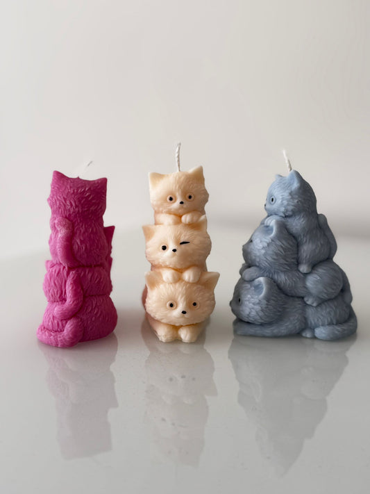 3 katzen sind übereinander mit 3 Farben